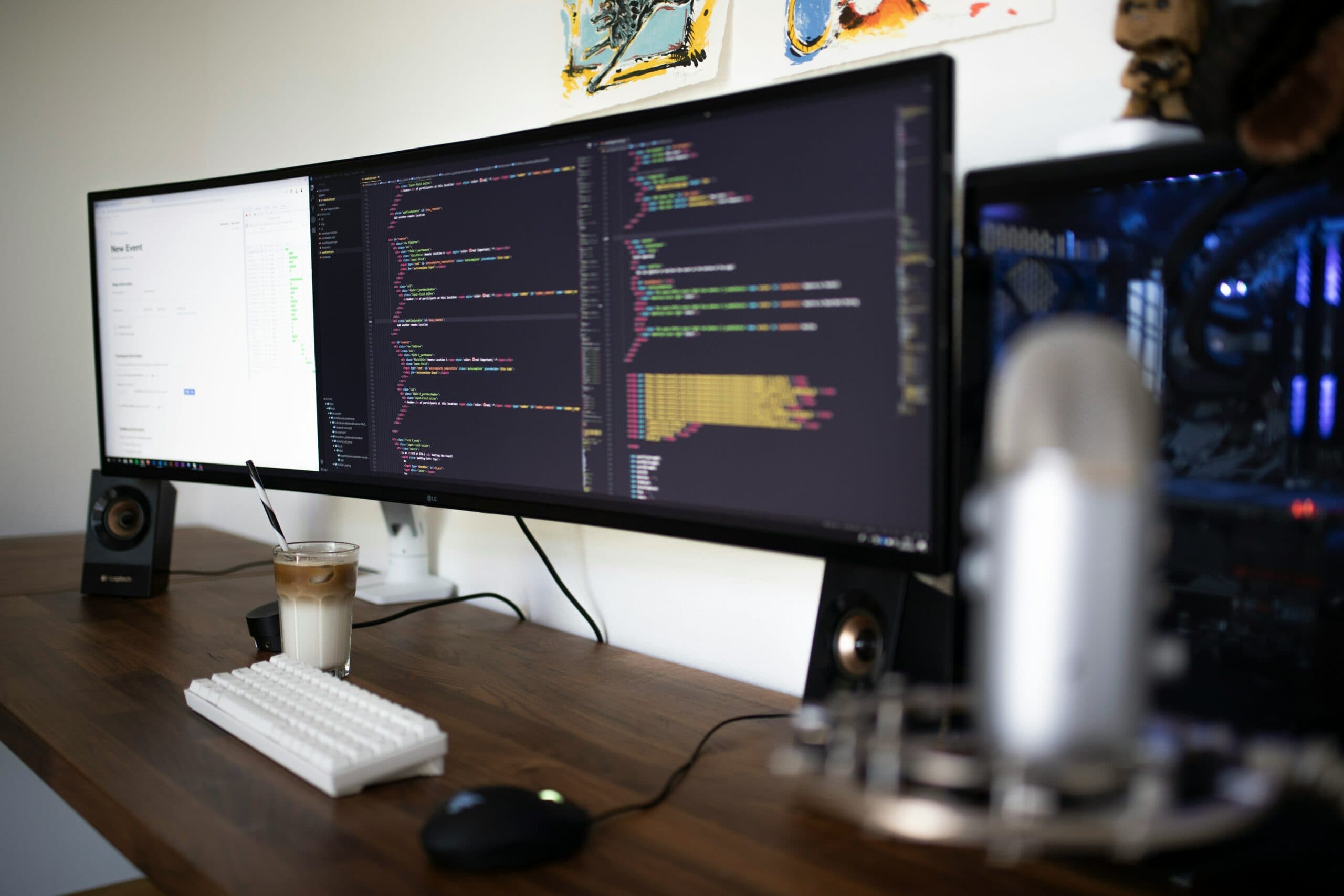 code on a screen at an empty desk